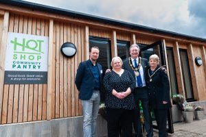 Tamworth Co-op’s chief executive officer designate Dan Welsh with the Mayor and Mayoress of Tamworth outside the Glascote community pantry