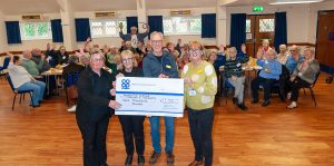 Pictured at the cheque presentation are: (l-r): Whittington Co-op supervisor Lorraine Brown, the store’s manager Sheila Villers and Dementia Caring trustees Barry Coleman and Gill Willis.