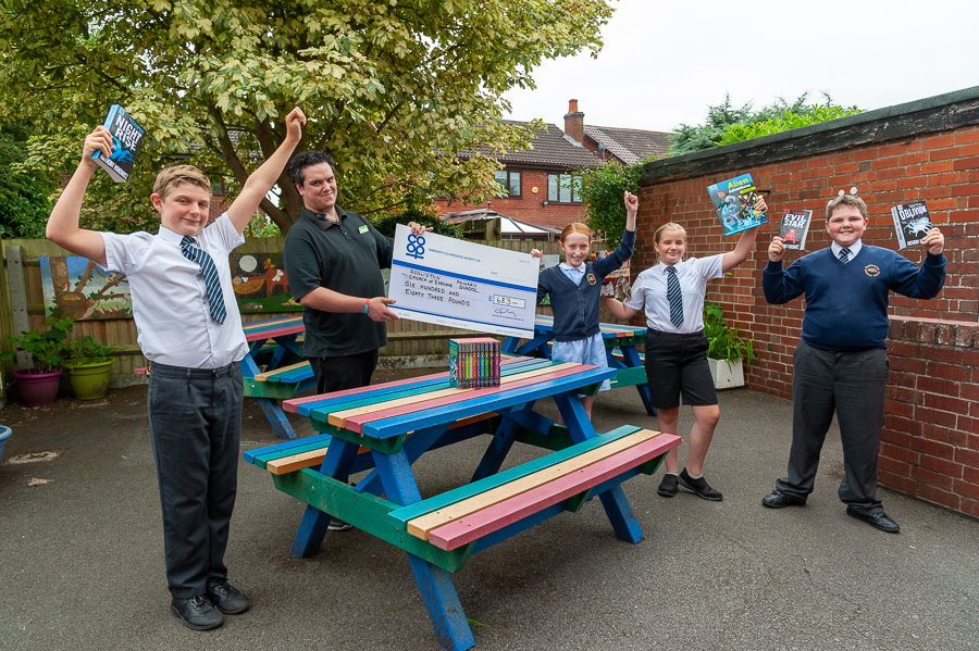 Community Dividend Fund helps Rosliston school to buy books