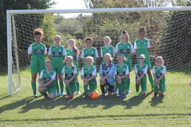 Bolehall shoppers’ dividends help girl footballers to reach their training goals