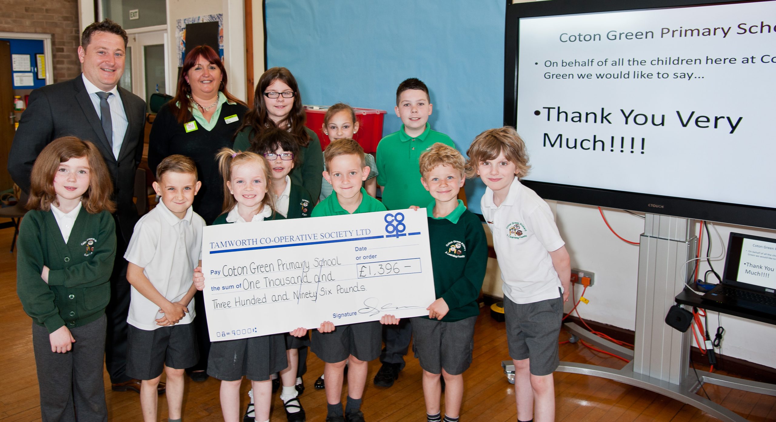 Hundreds of pupils cheer the Tamworth Co-op at assembly
